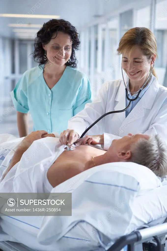 Doctors and patient in hospitalization