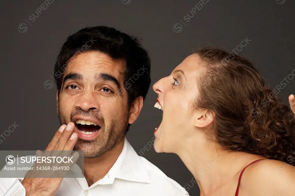 Woman screaming at a man while he doesn´t seem to care or listen
