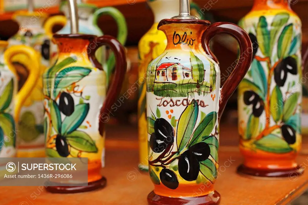 Ceramic olive oil bottles on display, Central Market, Florence, Italy