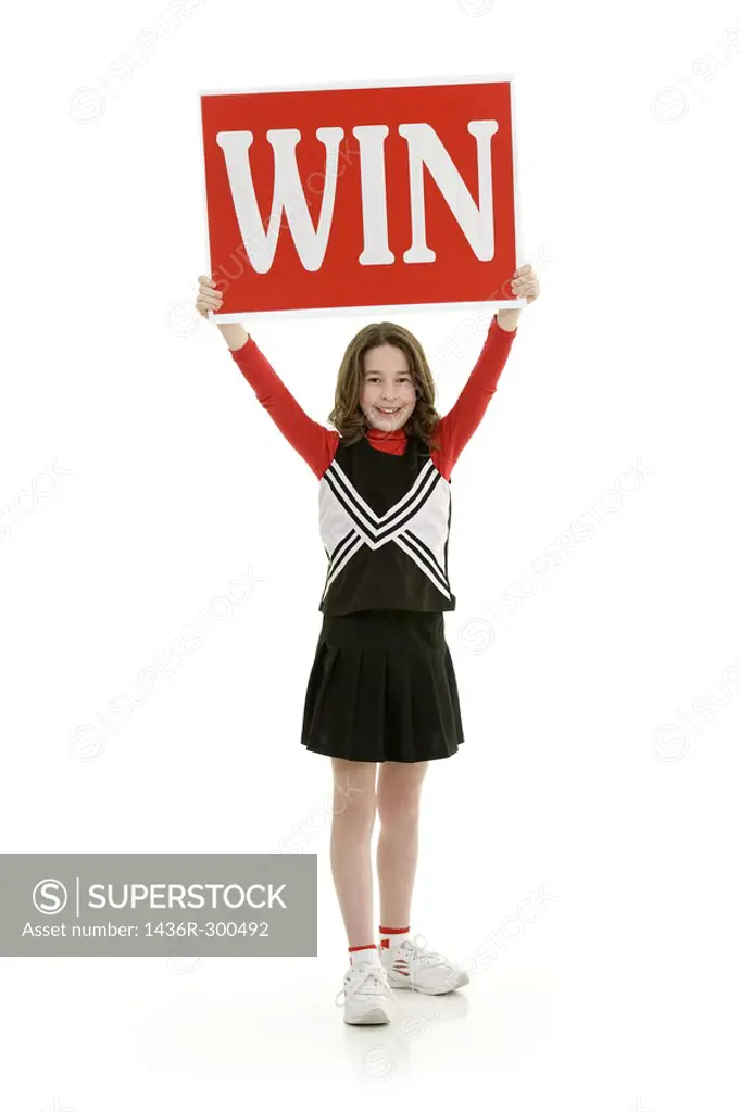 Ten year old caucasian girl dressed as cheerleader