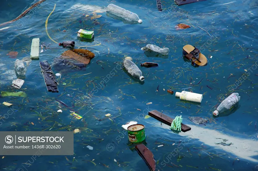 Plastic bottles and rubbish floating in the sea, Maldives.