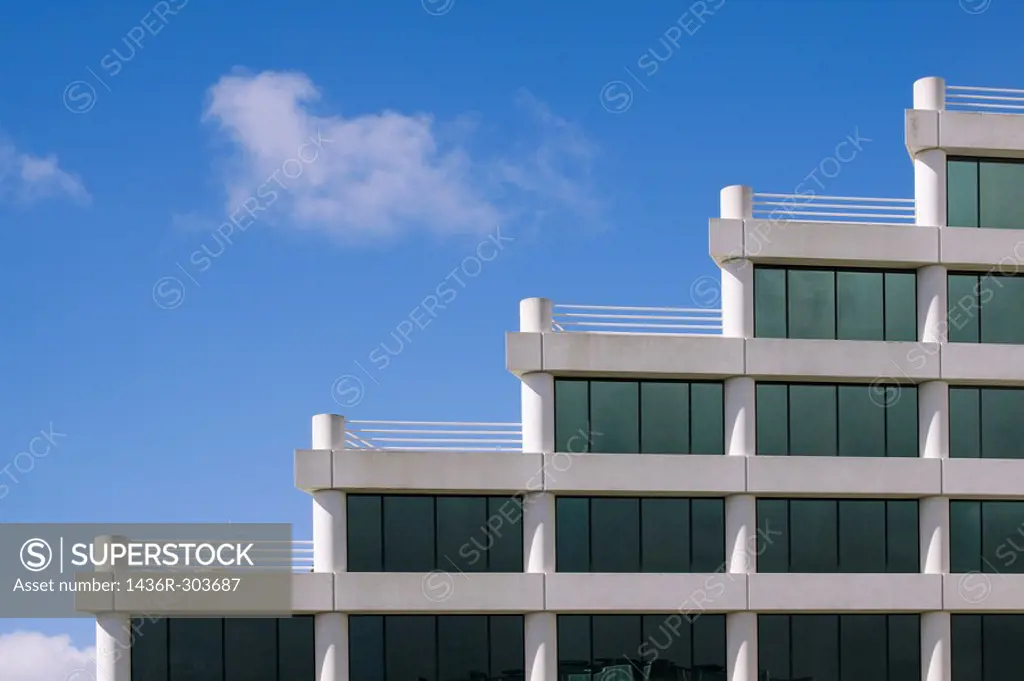 Architectural detail of modern office building in Silicon Valley with rooftop terraces in a stairstep pattern. San Mateo, California, USA.
