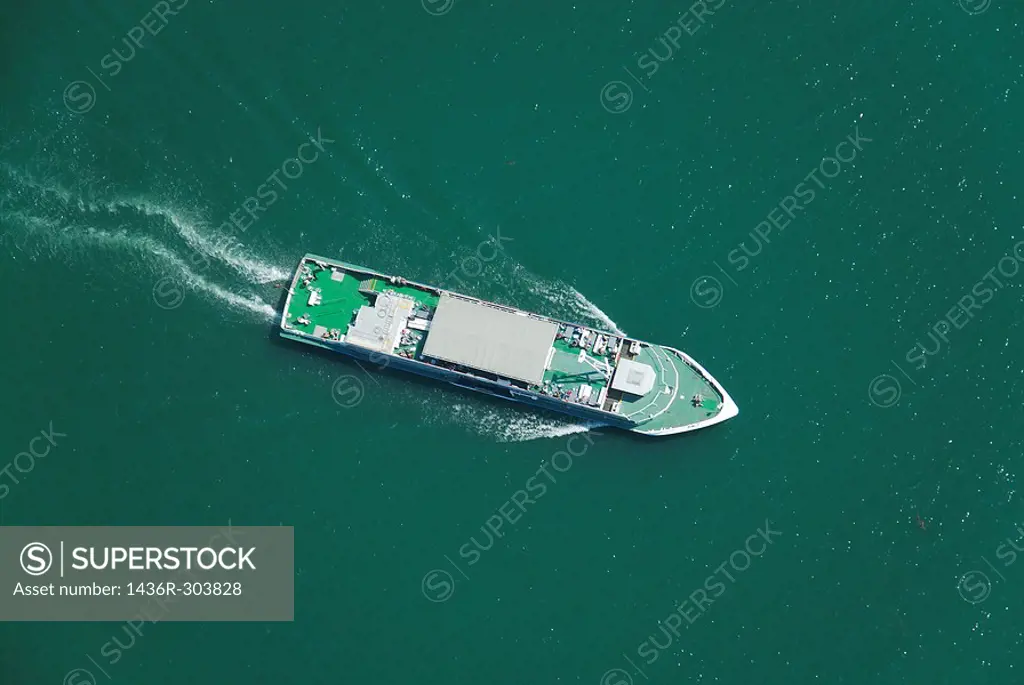 Aerial view from an airship dirigible Zeppelin NT of a ferry boat crossing German and austrian border on Constance lake Bodensee, Germany / Austria