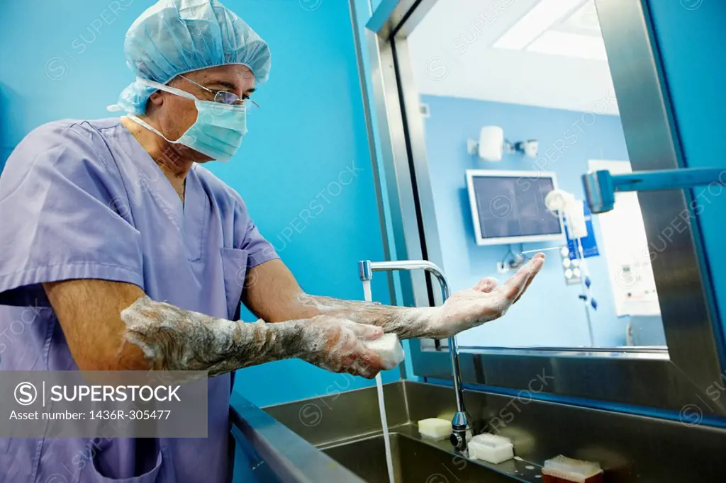 Surgeon washing hands, operating room. Hospital Policlinica Gipuzkoa, San Sebastian, Donostia, Euskadi, Spain