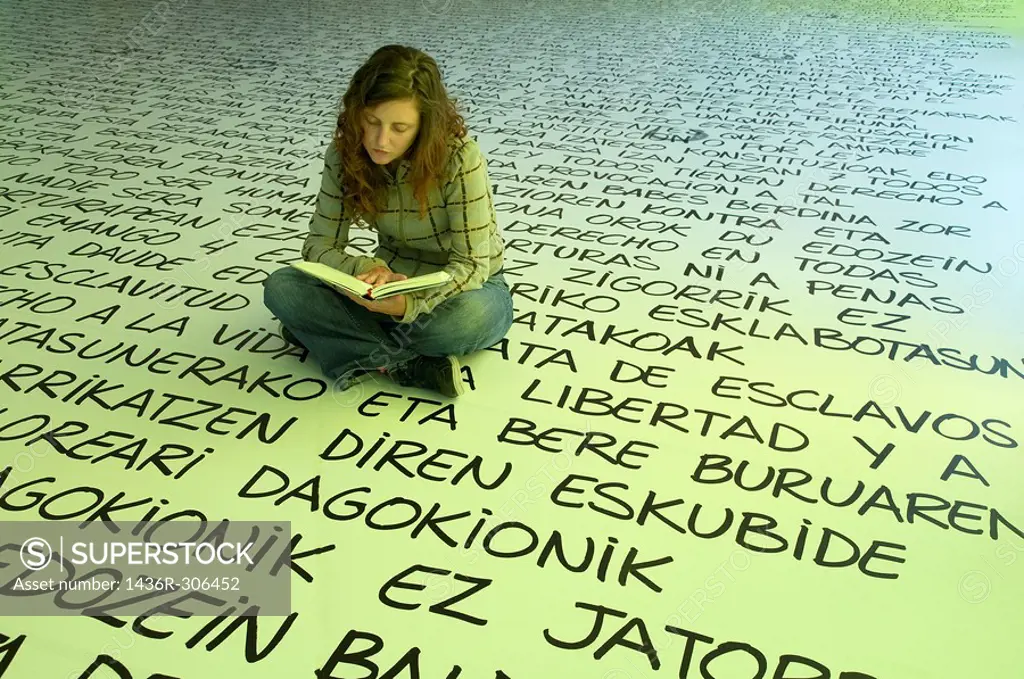 Girl reading a book, Human Beings Exhibition in the Culture House, Aiete Park, Donostia-San Sebastián, Guipúzcoa, Basque Country, Spain