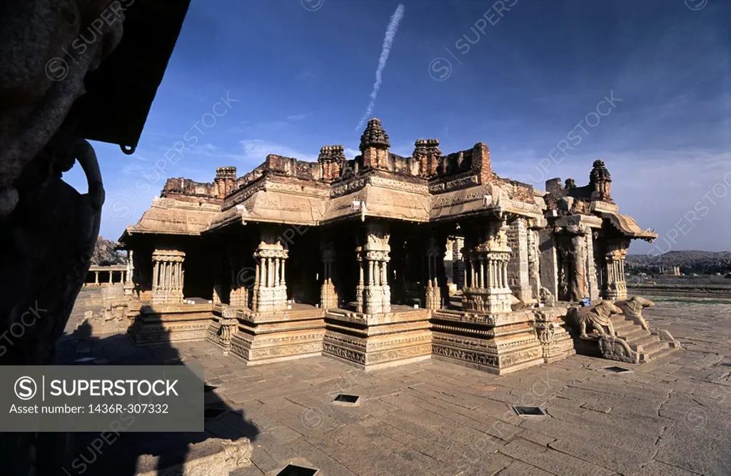 Sabha Mandap with its intricately carved monolith pillars in Shri Vijayavitthala Temple in Hampi, Karnataka  The construction of this temple started d...