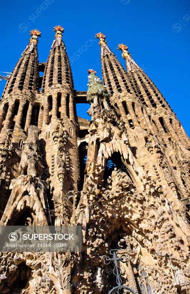 Facade of the Sagrada Familia, Church of the Holy Family (Gaudí, 1883-...). Barcelona. Spain