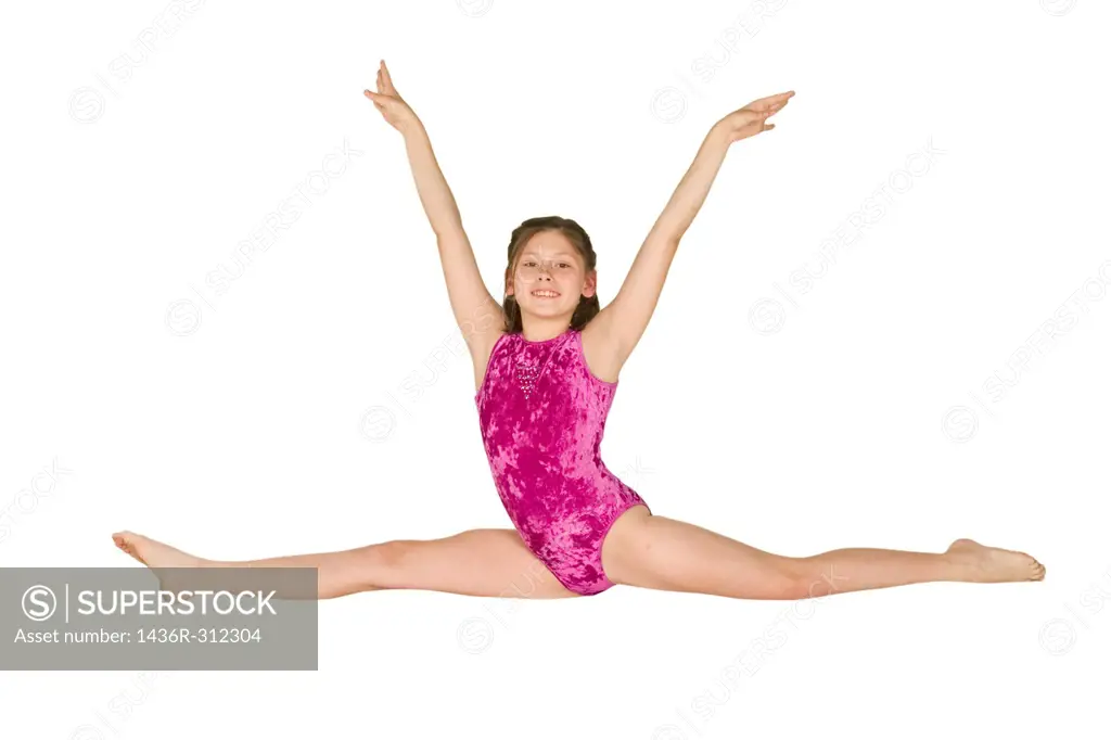 Ten year old caucasian girl in gymnastics poses