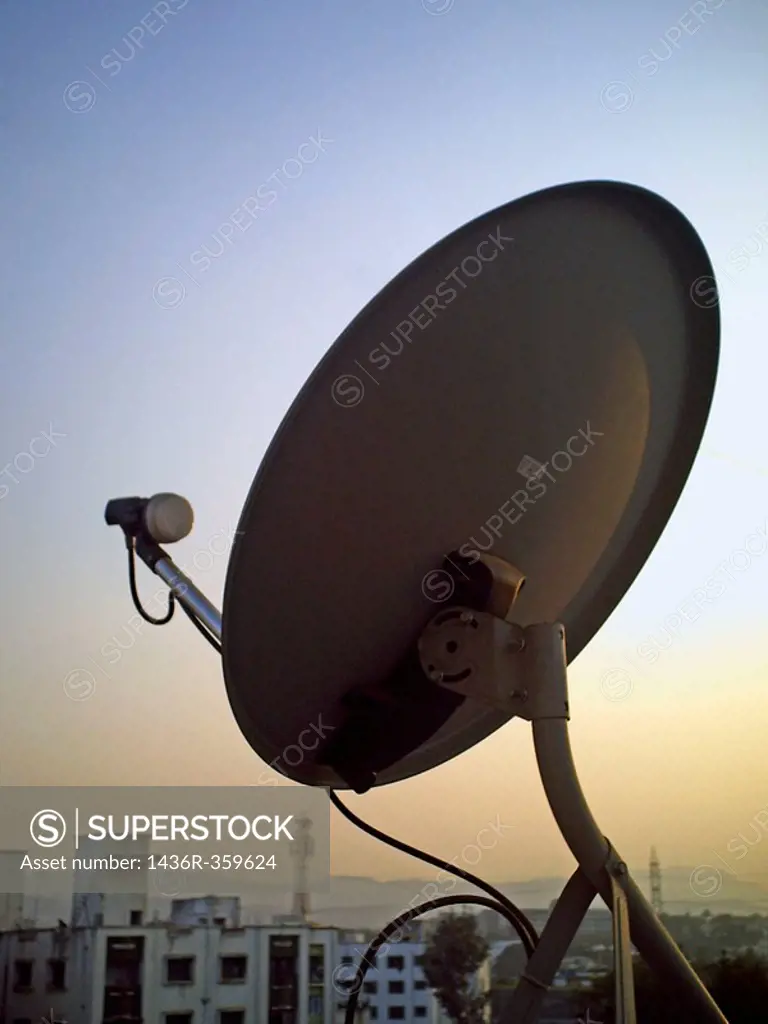 A dish antena of a television set on a building terrace  Pune, Maharashtra, India