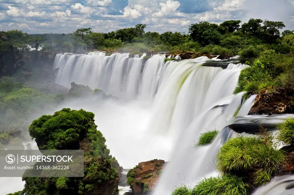 Iguassu Falls is the largest series of waterfalls on the planet, located in Brazil, Argentina, and Paraguay  At some times during the year one can see...
