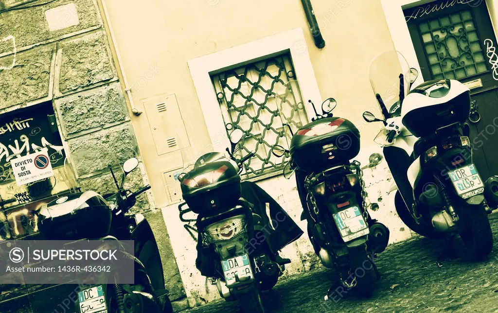 four motor scooter in the historic center of Rome, Lazio, Italy
