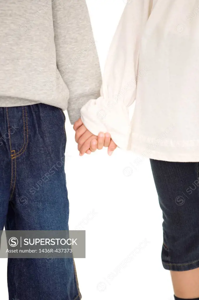 Boy holding hands with girl