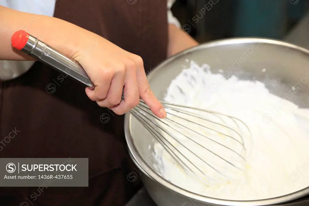 Pastry Chef Beating Whipping Cream