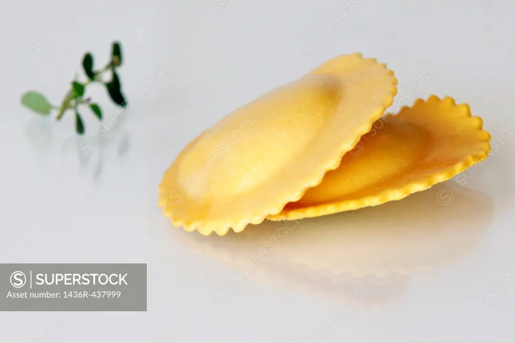 Fresh uncooked Ravioli Stuffed Pasta on white background