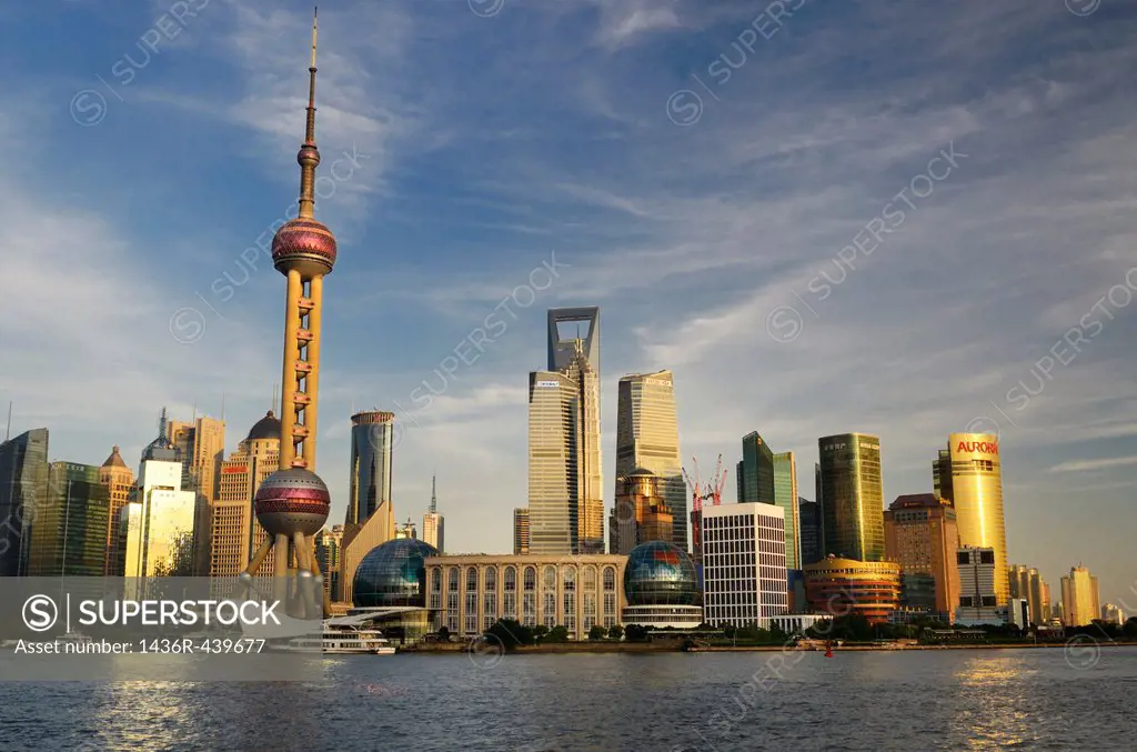 Sunset glow on high rise financial towers and hotels in the Pudong east side of Shanghai China