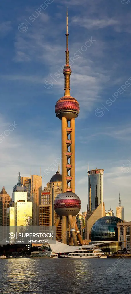 Sunset glow on Oriental Pearl Radio & TV Tower on Pudong east side of Shanghai China