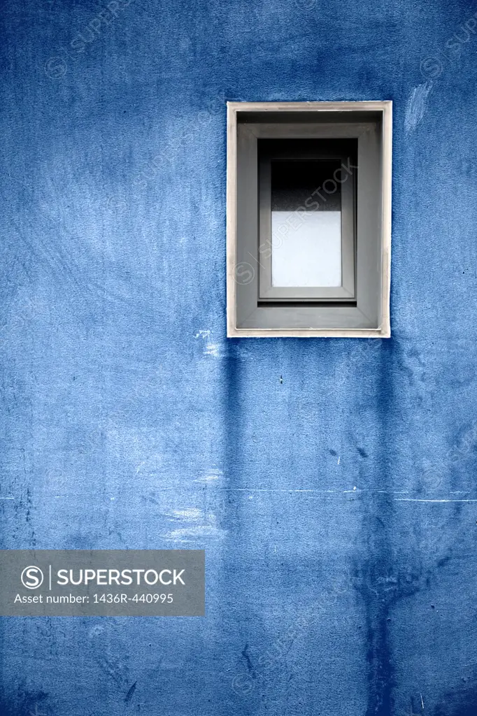 blue wall with a window