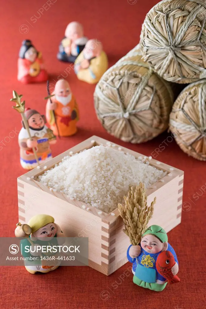 Rice in Measuring Cup and Seven Lucky Gods and Rice Bale