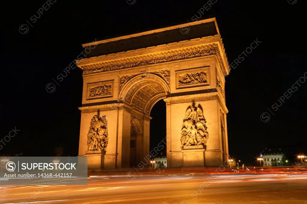 Arc de Triomphe and traffic at night, Paris, France