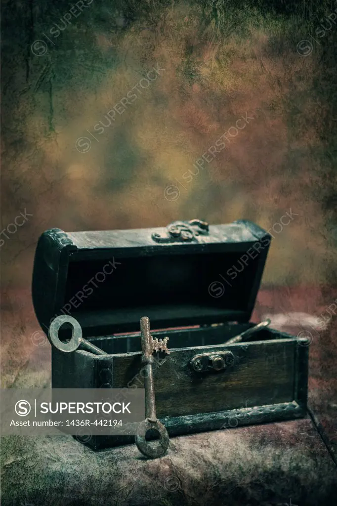 old, rusty keys in a dusty chest