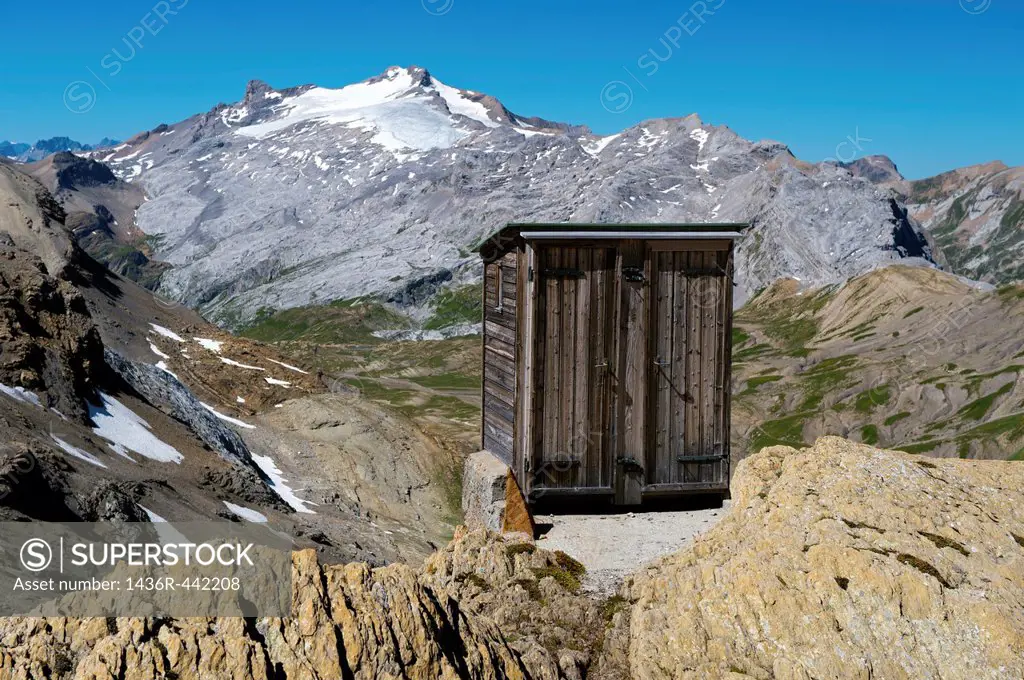 Former toilet house of the mountain hut Wildstrubelhuette of the Swiss Alpin Club SA with a great view at Mt Wildhorn, Bernese Alps, Switzerland