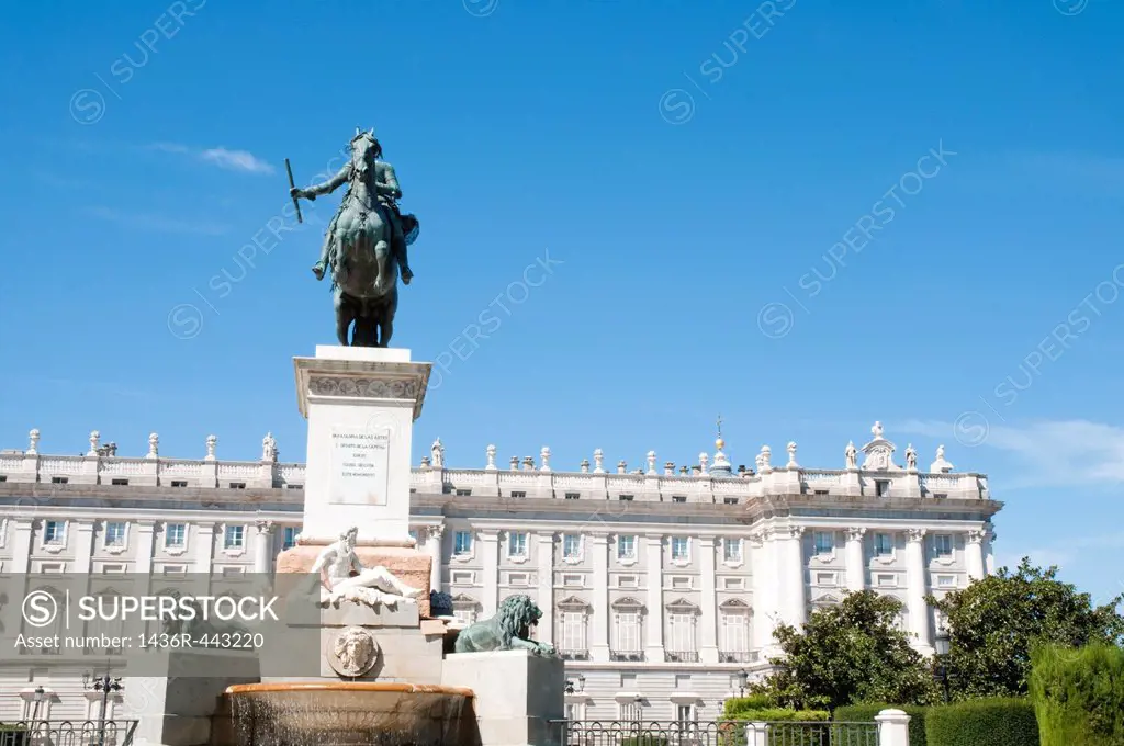 Felipe IV statue and Royal Palace. Oriente Square, Madrid, Spain.