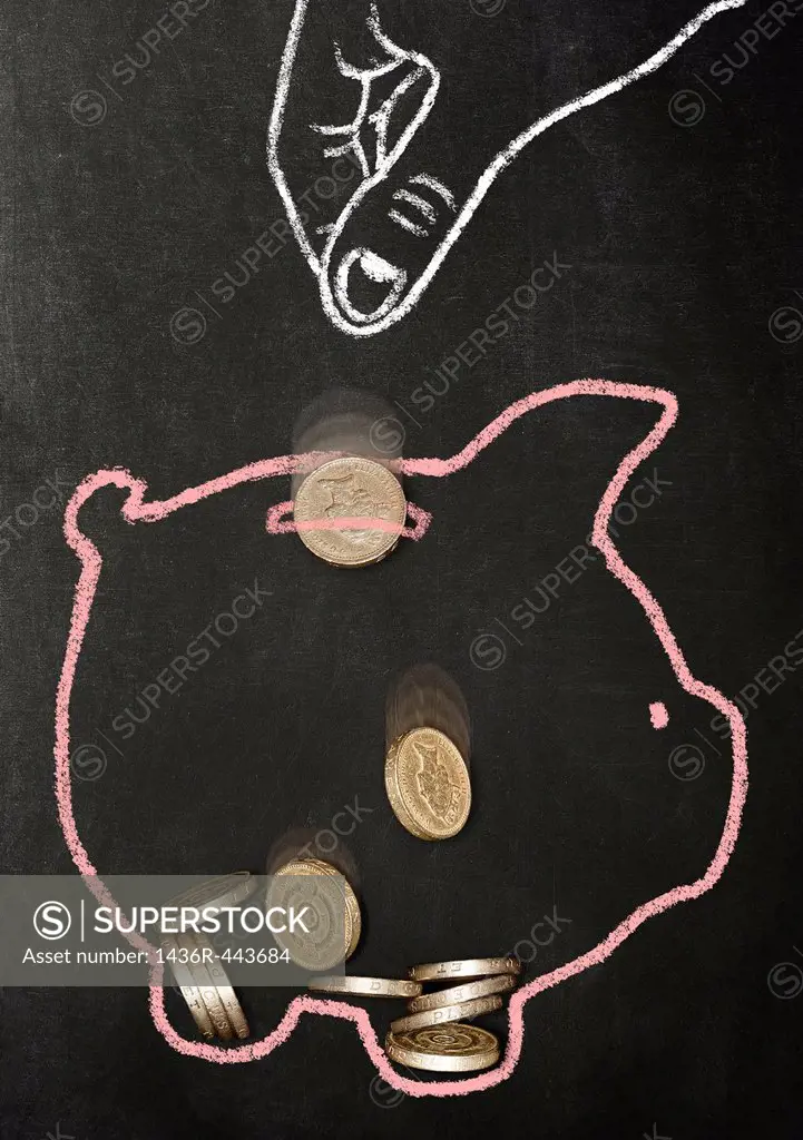 Chalk drawn hand dropping real pound coins into a chalk drawn piggy bank