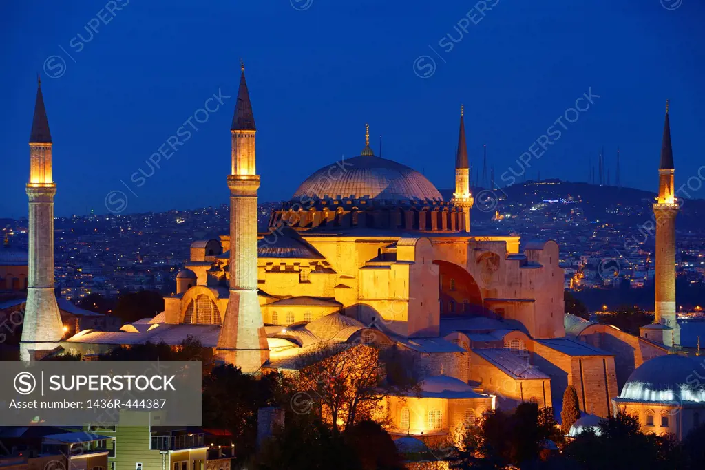 Night lights on Hagia Sophia and Sultan Selim Murat Turbesi at twilight in Istanbul Turkey