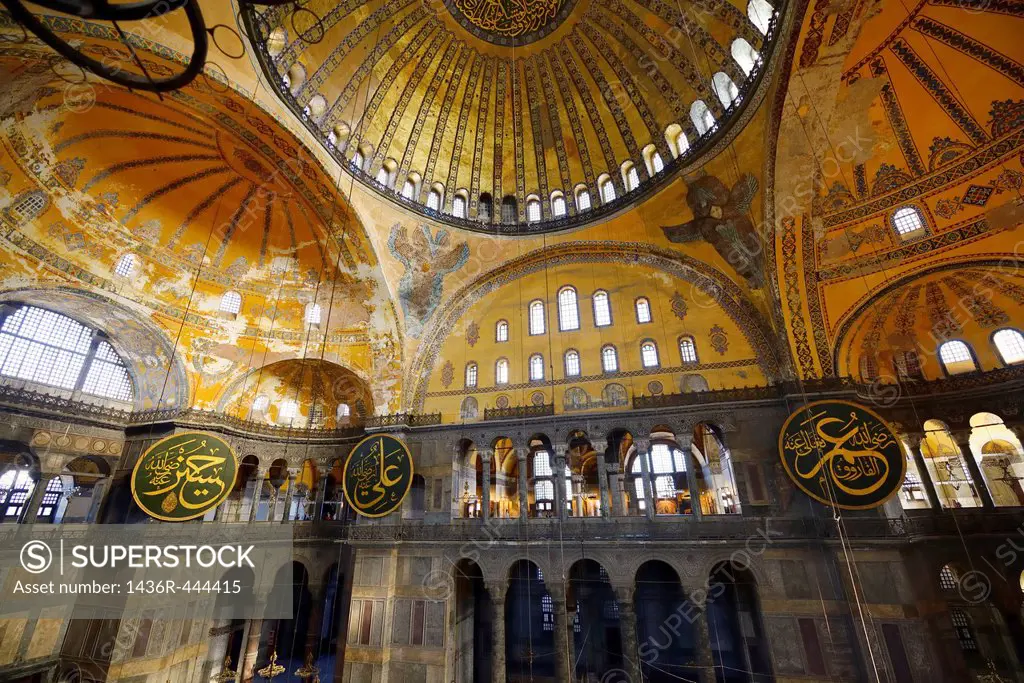 Golden domes frescoes and six winged Saraphim in the Hagia Sophia with wood roundels