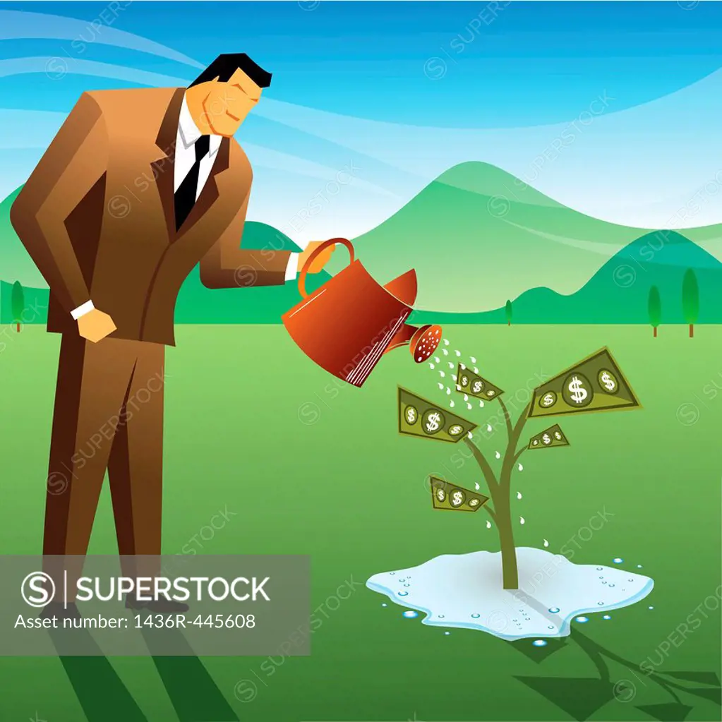 Businessman watering a money plant