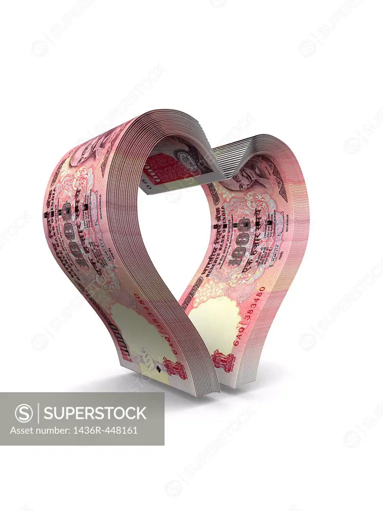 Indian currency notes forming heart shaped