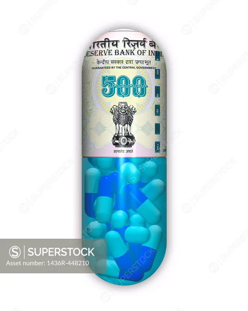 Five hundred rupees banknote on a capsule