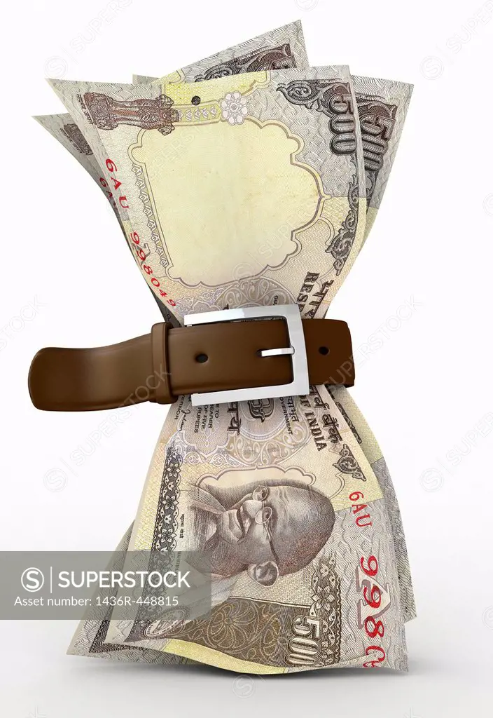 Indian five hundred Rupee note tied up by a belt