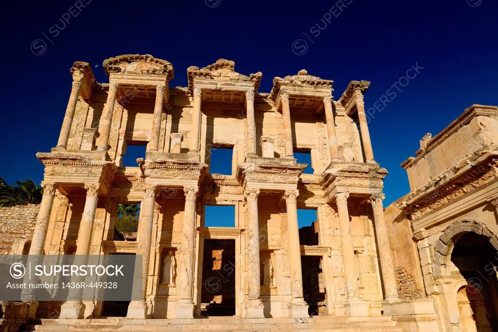 Ruins of the facade of the Library of Celsus and Mazaeus gate to the Agora of the ancient city of Ephesus Turkey