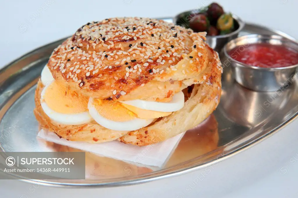 Borek (Also Burek) a Turkish pastry filled with cheese or potato or mushroom with hard boiled egg.