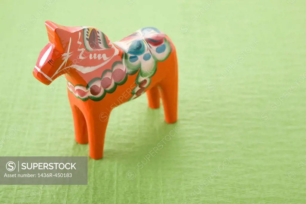 Dala Horse on Green Paper