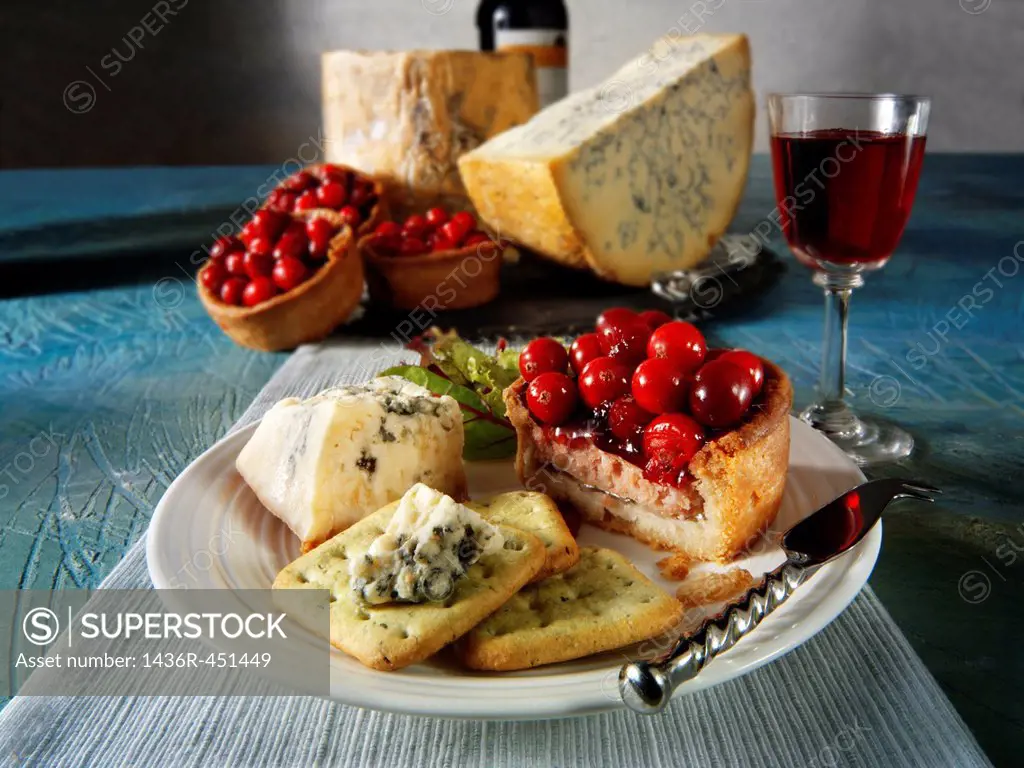 Traditional blue Stilton cheese with cranberry pork pie.
