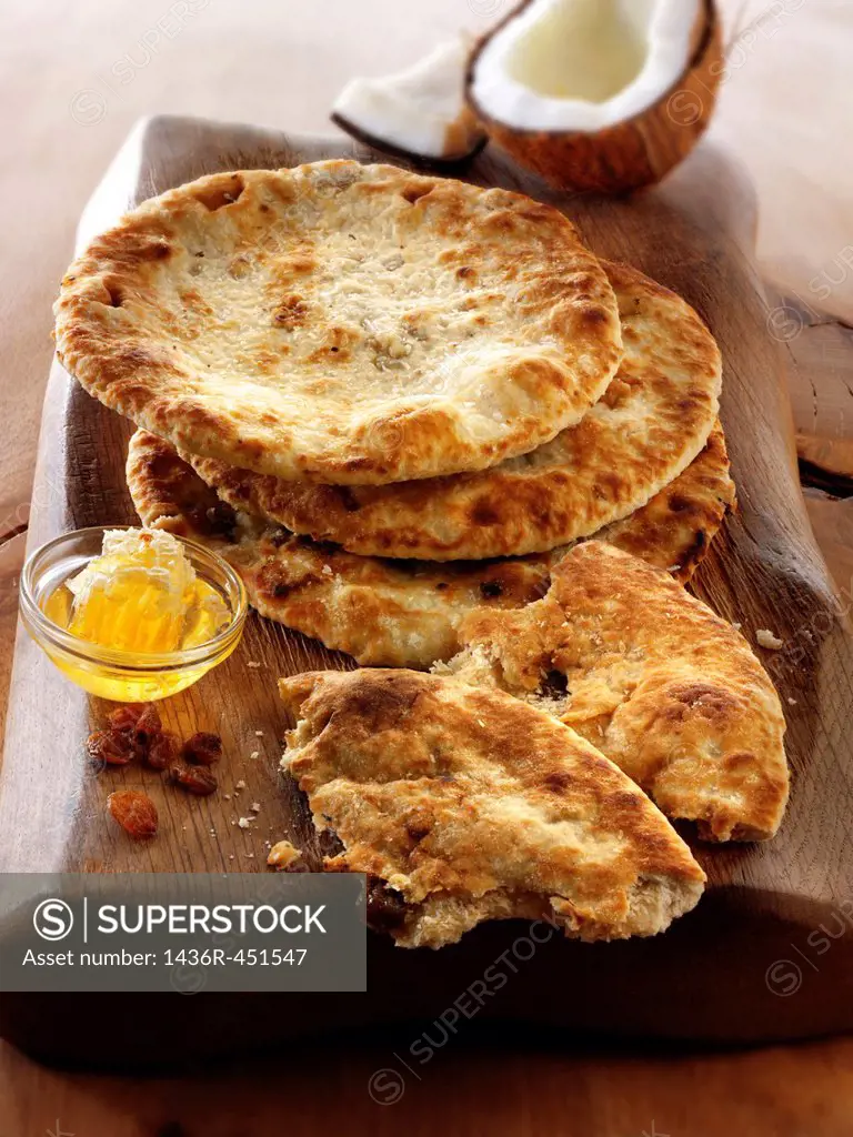 Peshwari Naan. coconut sultanas and honey Bread - Indian Cuisine food