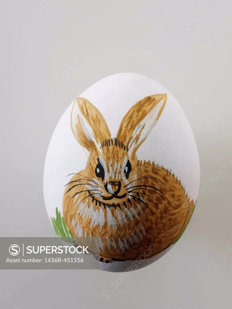 Traditional decorated Easter eggs with easter bunny illustration.