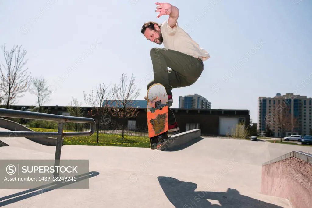 Canada, Ontario, Kingston, Man skateboarding in skate park