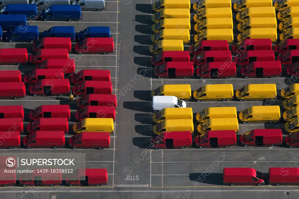 UK, Essex, Purfleet Docks, Aerial view of rows of colorful vans