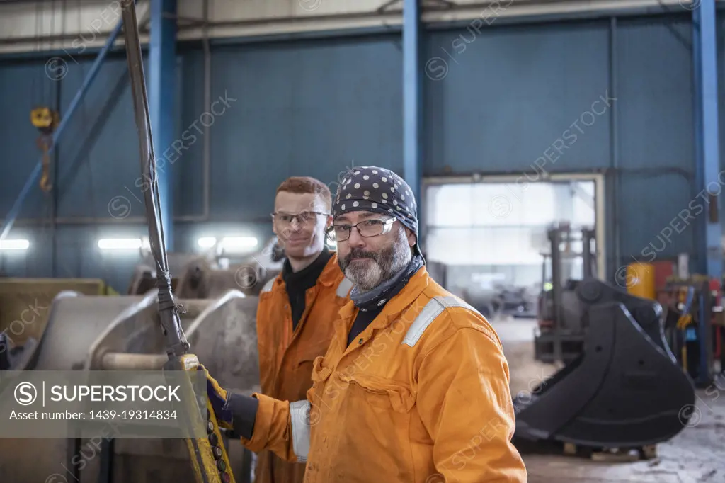 Portrait of male engineers in engineering factory