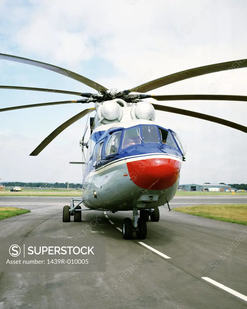 Stationary helicopter on runway