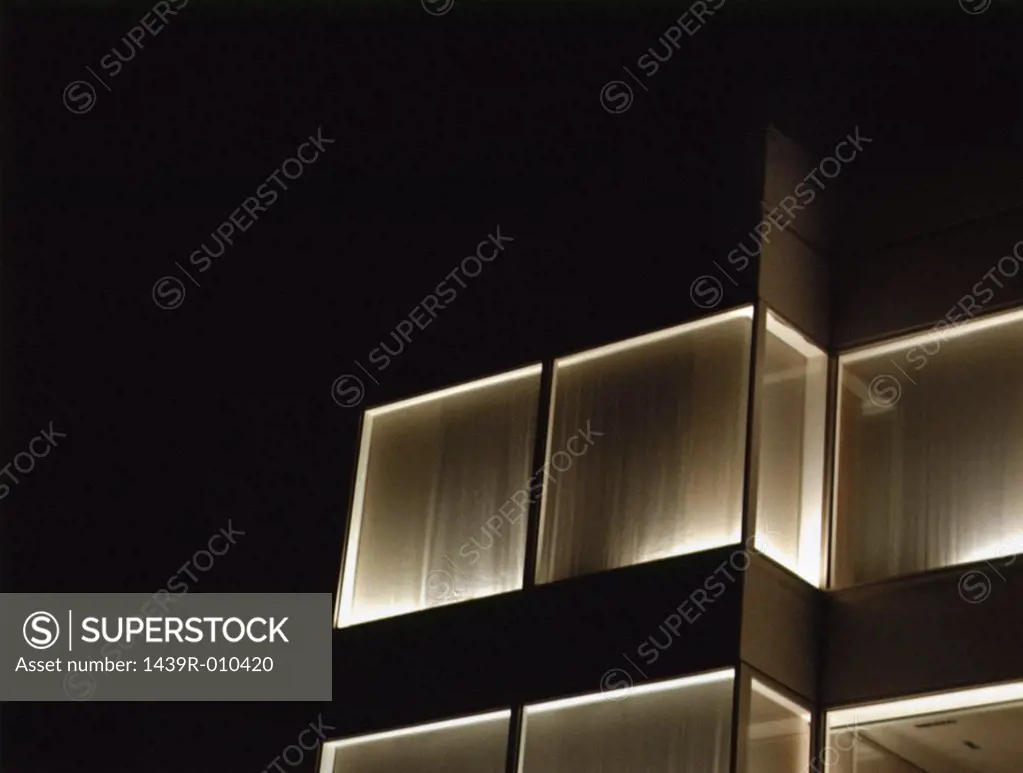 Illuminated windows on multistorey building