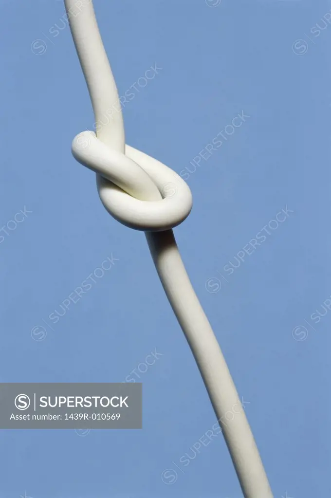 Electrical cable with knot