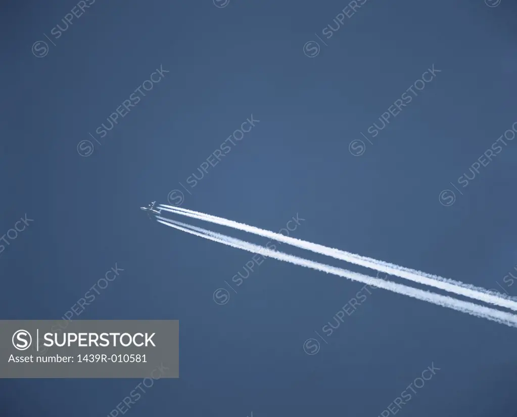 An aeroplane with vapour trail