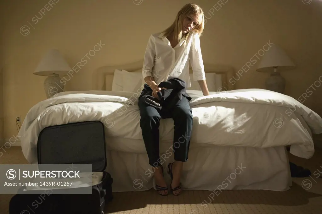 Lonely woman in hotel room