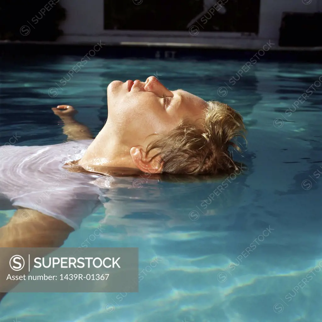 Young woman in swimming pool