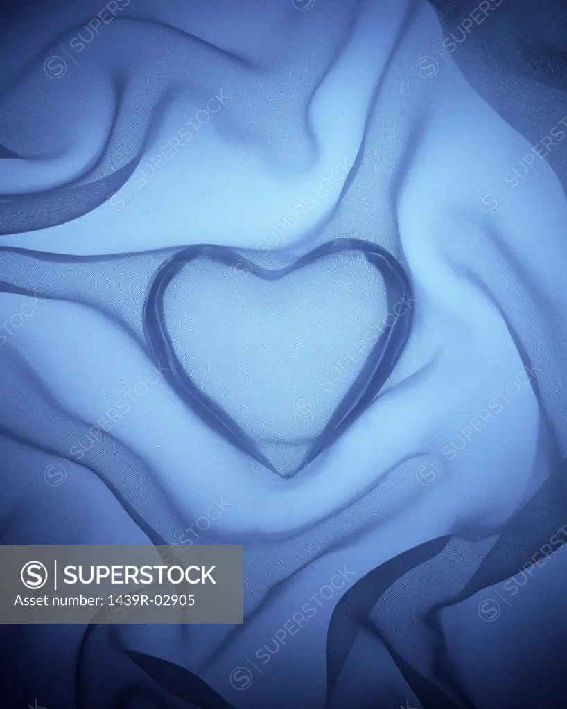 Heart covered in blue silk