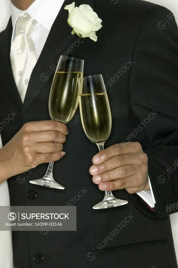 Newlywed couple toasting